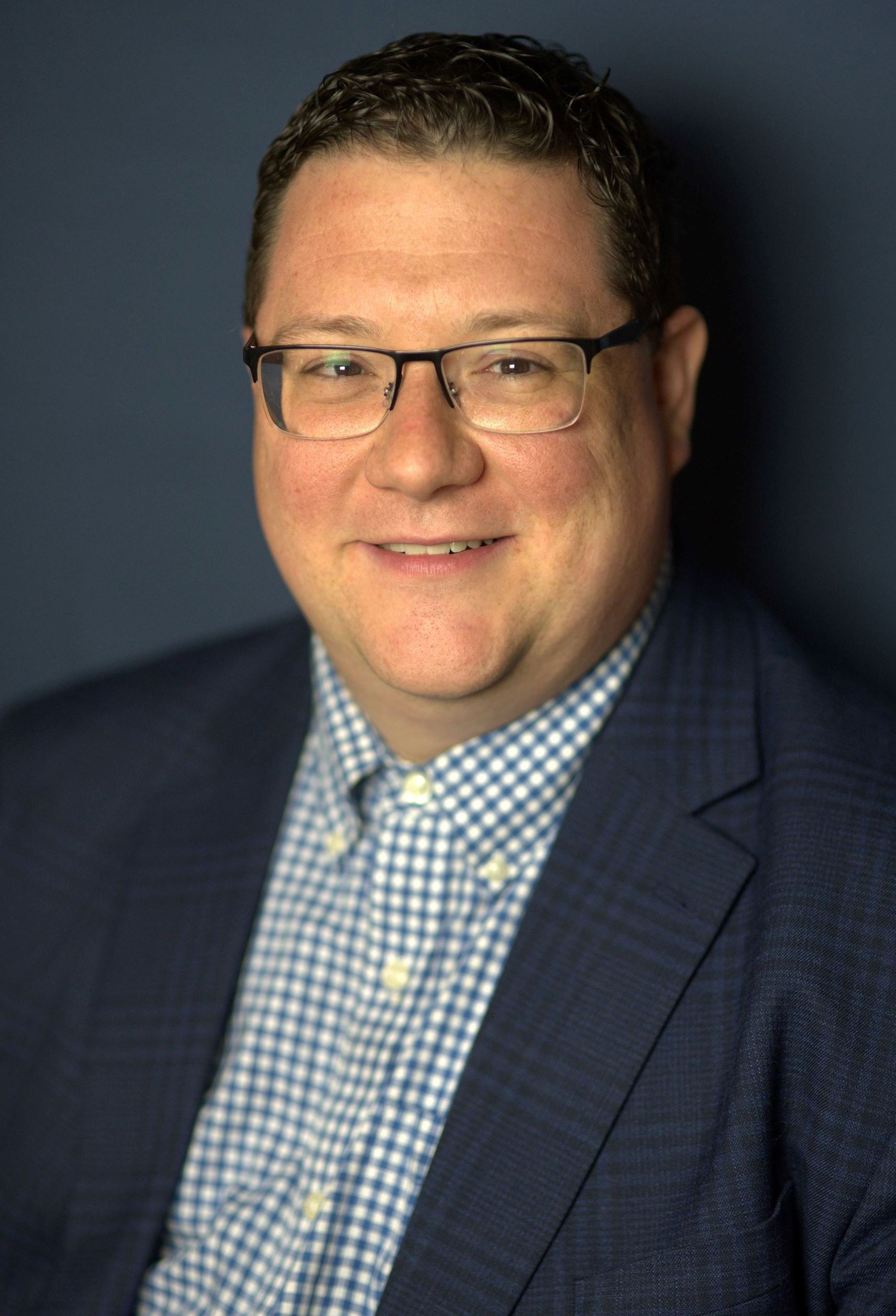 Seated photo of Supervisor Alex Scialdone